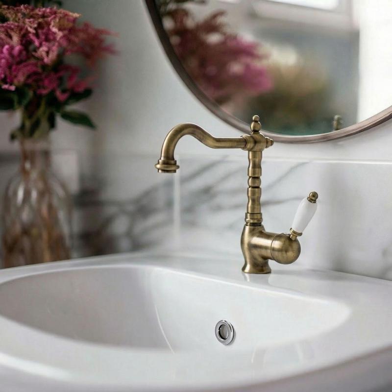 Grifo mezclador PB Nostalgic monomando de lavabo con caño giratorio 190 mm - con desagüe Bronce